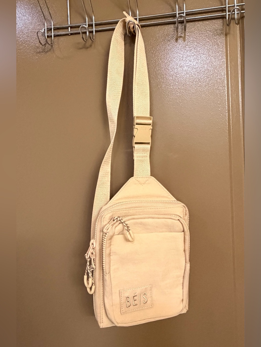 BEIS Sport Sling Bag in Beige